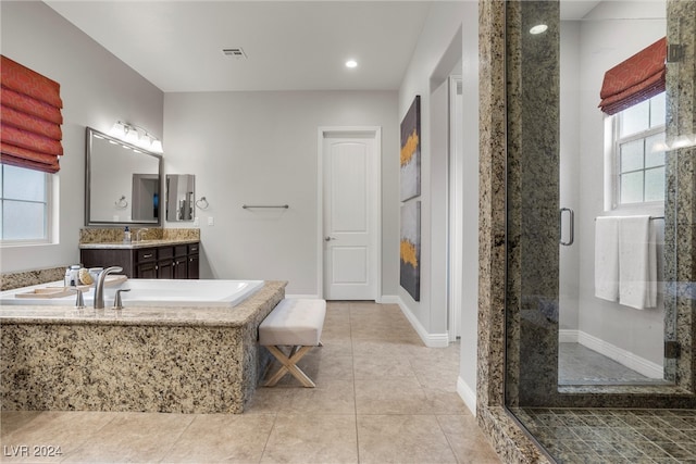 bathroom with vanity, shower with separate bathtub, tile patterned flooring, and plenty of natural light