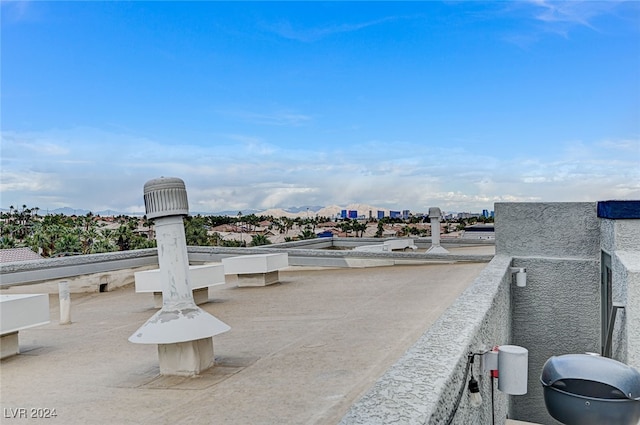 view of patio featuring a balcony