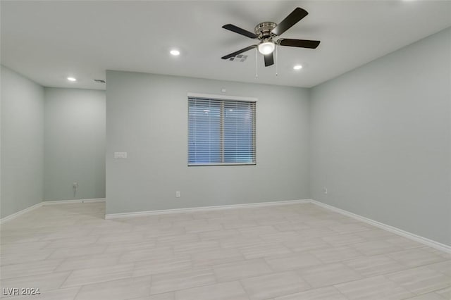 unfurnished room featuring ceiling fan