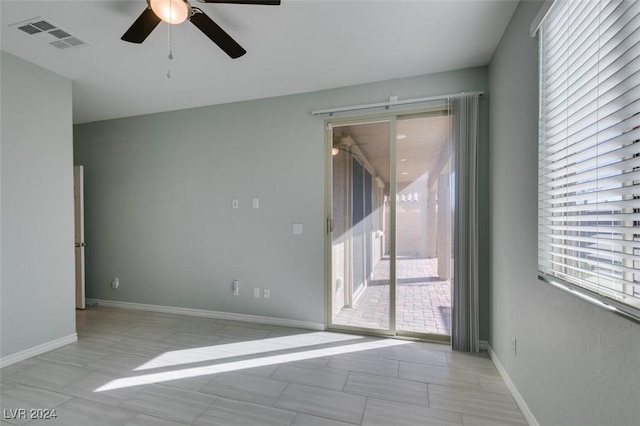 spare room featuring ceiling fan