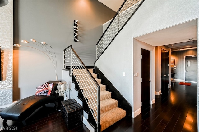 staircase featuring hardwood / wood-style flooring