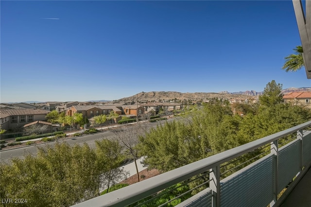 balcony featuring a mountain view