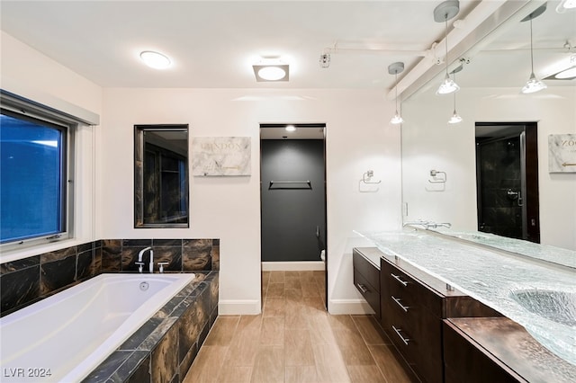 bathroom with vanity and plus walk in shower