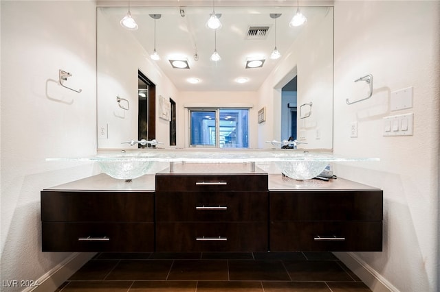 bathroom featuring vanity and tile patterned floors