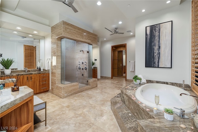 bathroom with vanity, ceiling fan, and independent shower and bath