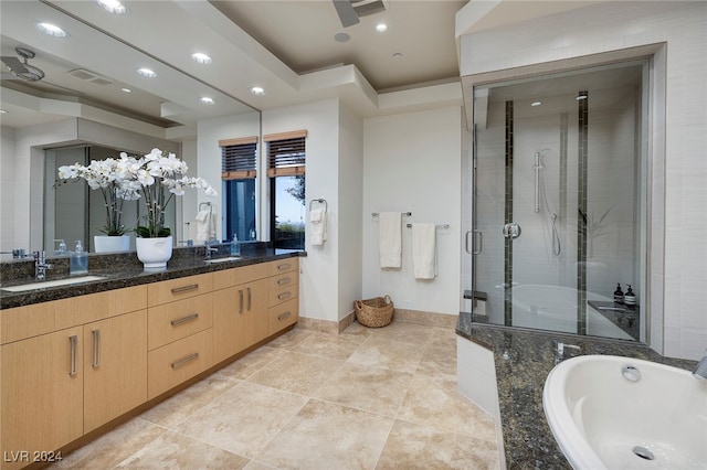 bathroom with vanity, tile patterned floors, and separate shower and tub