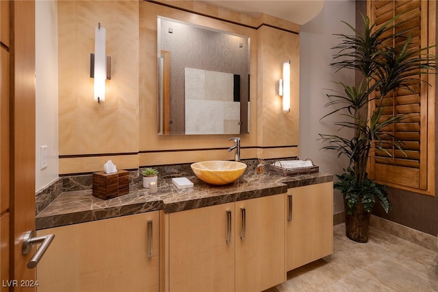 bathroom with vanity and tile patterned floors