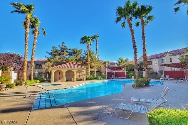 view of swimming pool featuring a patio area