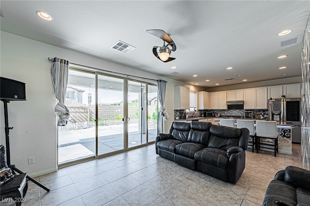 living room featuring light tile patterned floors