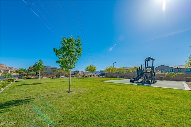 view of community featuring a yard and a playground