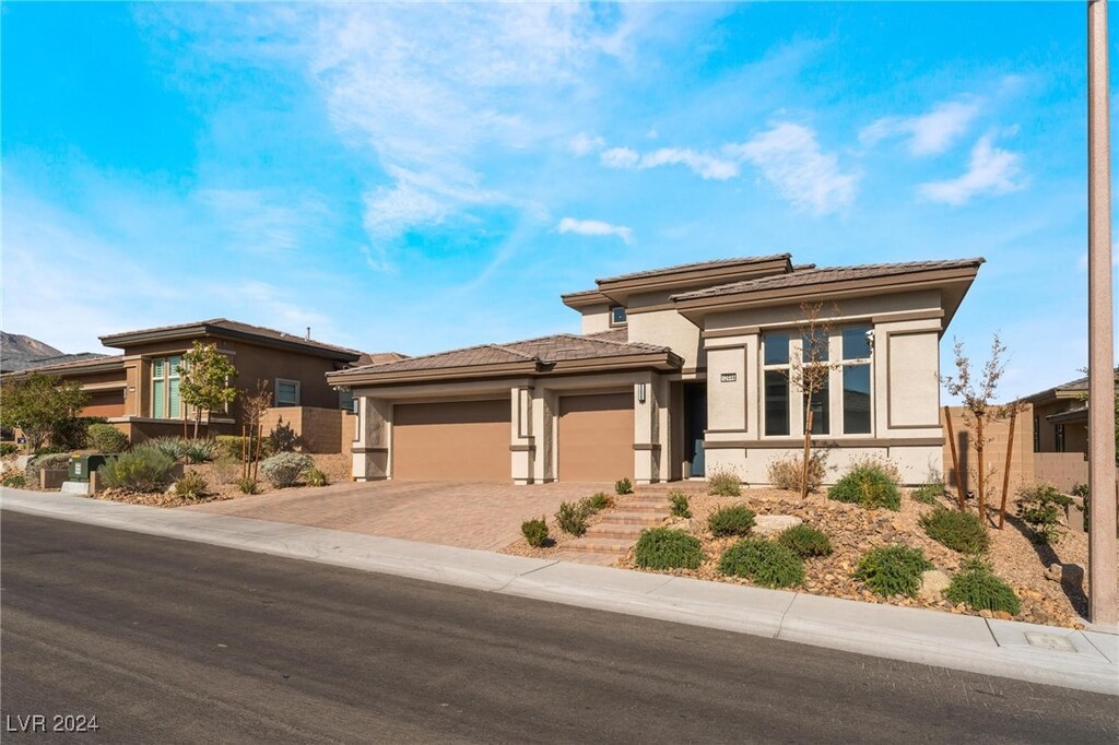 prairie-style home with a garage