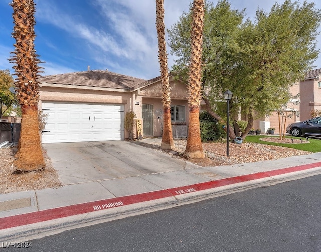 view of front of property featuring a garage