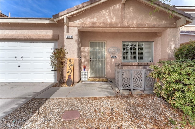 entrance to property with a garage