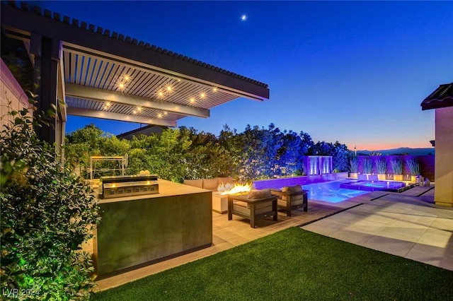 2567 Speyburn Ave, Henderson, NV 89044 - view of patio featuring an outdoor fire pit and a pool with connected hot tub