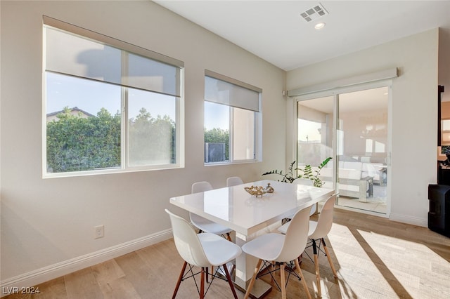 dining area with light wood-type flooring