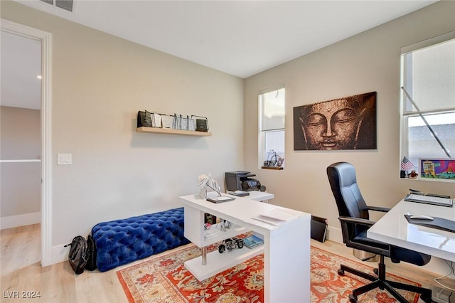 2567 Speyburn Ave, Henderson, NV 89044 - home office featuring light wood finished floors and baseboards