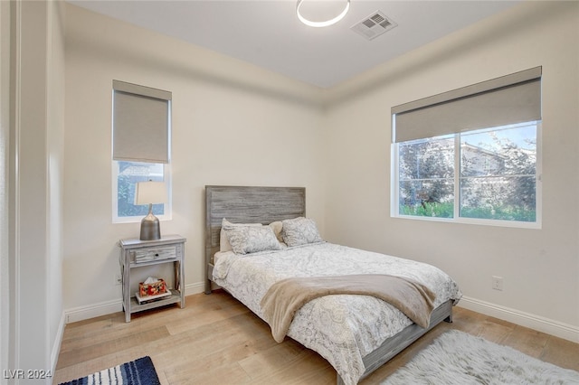 bedroom featuring hardwood / wood-style floors