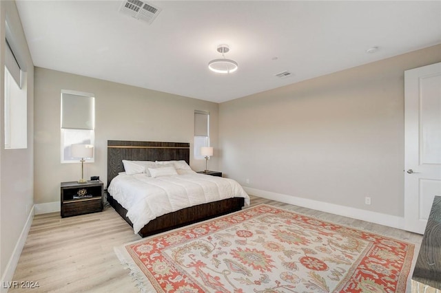 2567 Speyburn Ave, Henderson, NV 89044 - bedroom with light wood-style flooring and baseboards