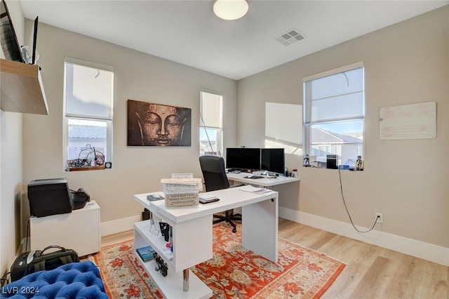 2567 Speyburn Ave, Henderson, NV 89044 - office space featuring plenty of natural light, light wood-style floors, and baseboards