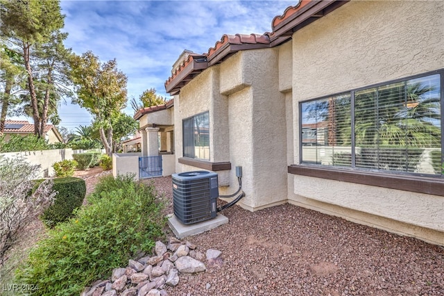 view of home's exterior featuring central AC