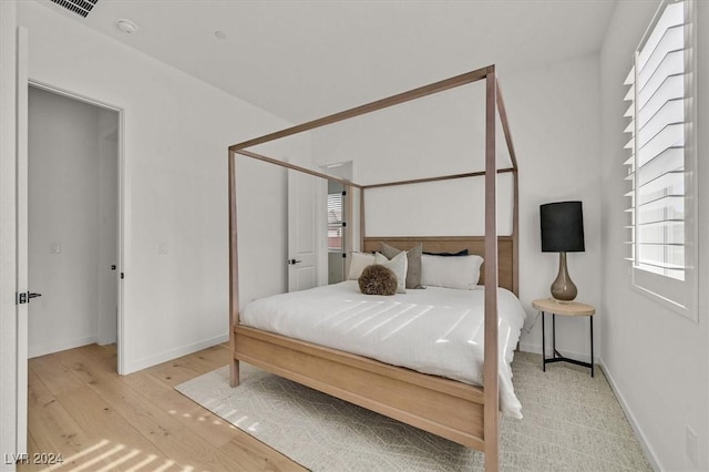 bedroom featuring light hardwood / wood-style floors