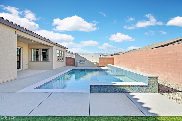 view of swimming pool with pool water feature