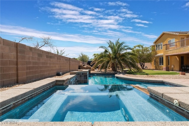 view of pool featuring a patio area