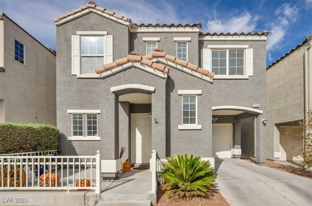 view of front of property featuring a garage