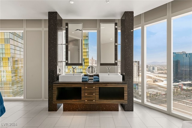 bathroom featuring vanity and tile patterned flooring