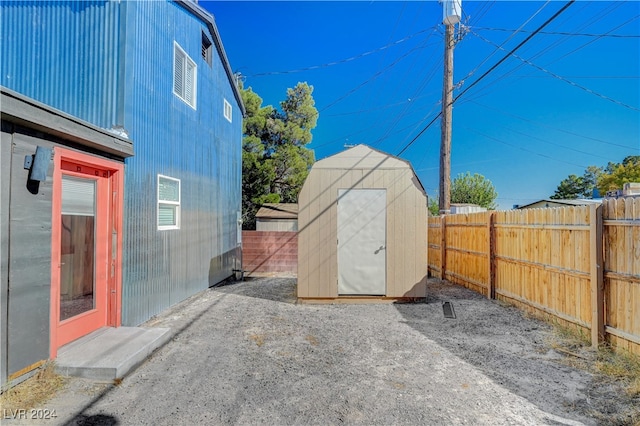 view of patio with a storage unit