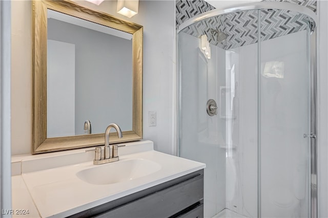 bathroom with vanity and walk in shower