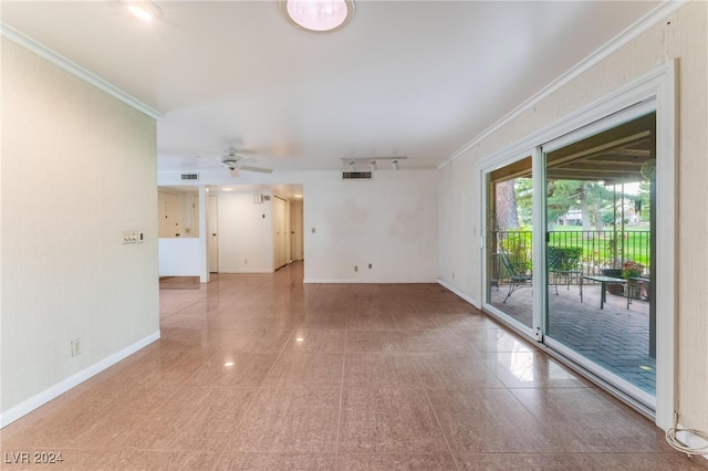 empty room featuring ceiling fan and ornamental molding