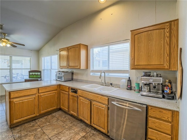 kitchen featuring vaulted ceiling, sink, stainless steel dishwasher, ceiling fan, and kitchen peninsula