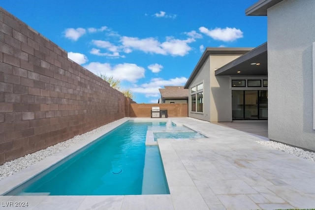 view of pool featuring a patio area