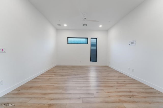 unfurnished room with light hardwood / wood-style floors and ceiling fan