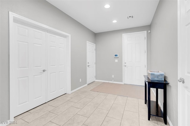 view of tiled foyer entrance