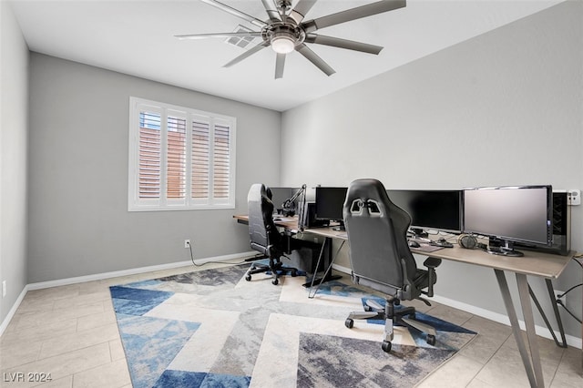 office area with ceiling fan and light tile patterned floors