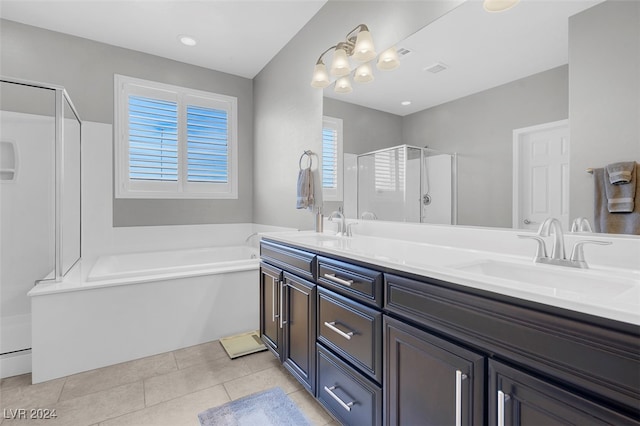 bathroom with plenty of natural light, vanity, shower with separate bathtub, and tile patterned flooring