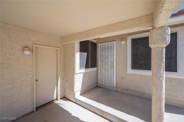 2259 Rugged Mesa Dr, Laughlin, NV 89029 - doorway to property featuring stucco siding