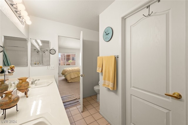 2259 Rugged Mesa Dr, Laughlin, NV 89029 - ensuite bathroom with tile patterned flooring and double vanity