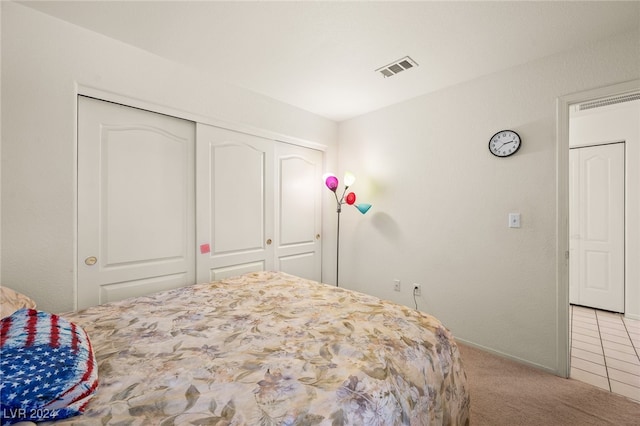 2259 Rugged Mesa Dr, Laughlin, NV 89029 - bedroom featuring light carpet and a closet