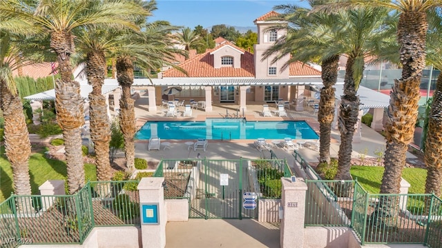 view of swimming pool featuring a patio area