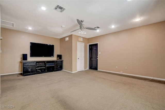 living room featuring light carpet and ceiling fan