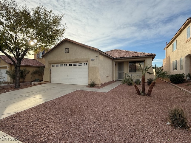 view of front of property with a garage