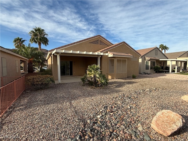 rear view of property with a patio