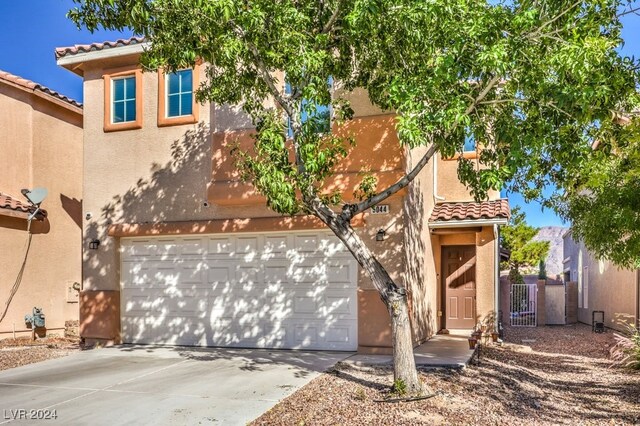 view of front of property with a garage