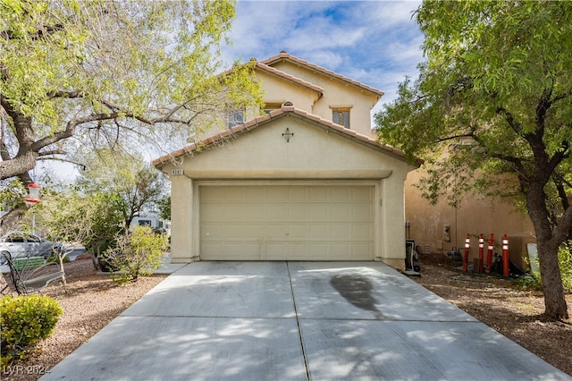 view of front of home with a garage