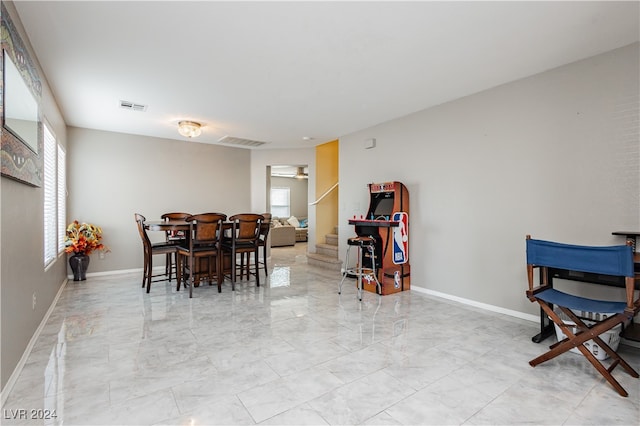 dining room featuring ceiling fan