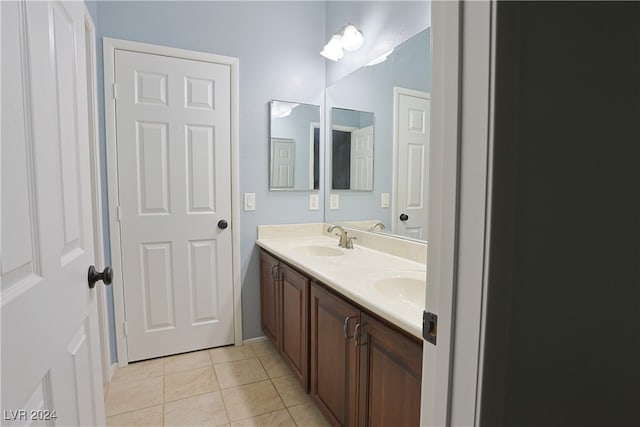 bathroom featuring vanity and tile patterned flooring