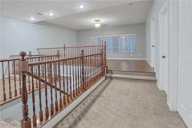 corridor featuring carpet flooring